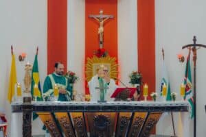 church service with priests celebrating the eucharist