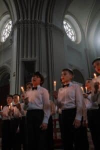 group of children holding candle lights